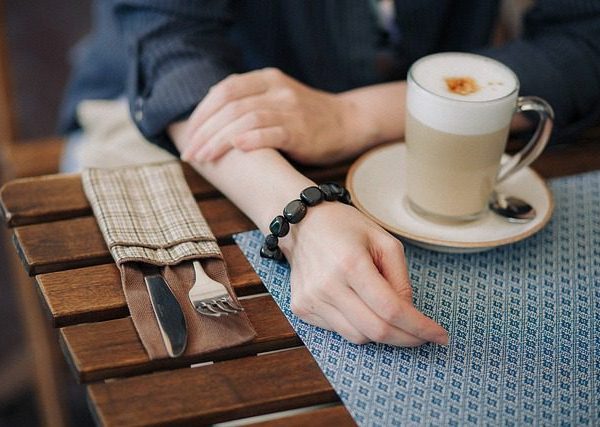 SITTING IN CAFE WITH COFFEE