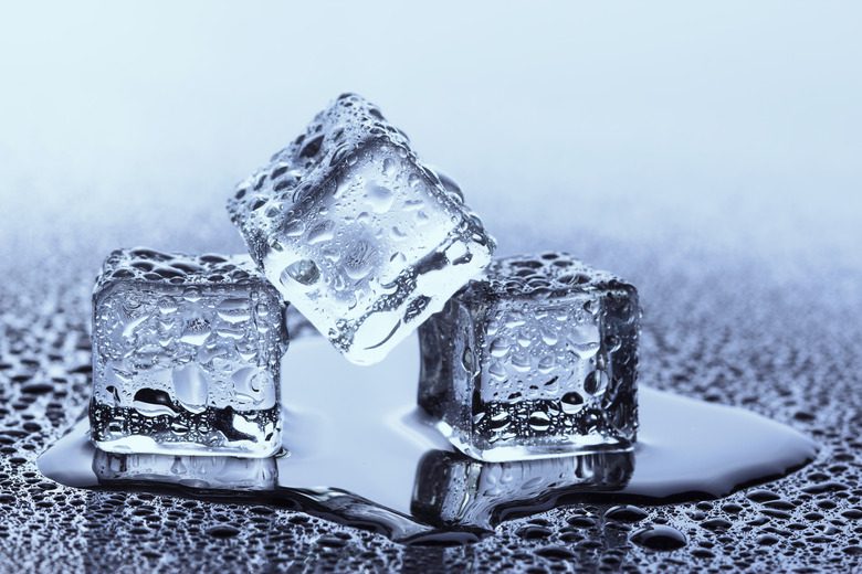 Close up on melting ice cubes - Sciencing.com