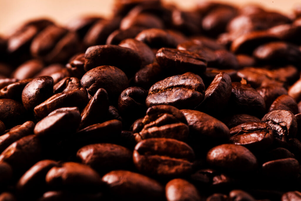 Close-up of brown coffee beans & IoT