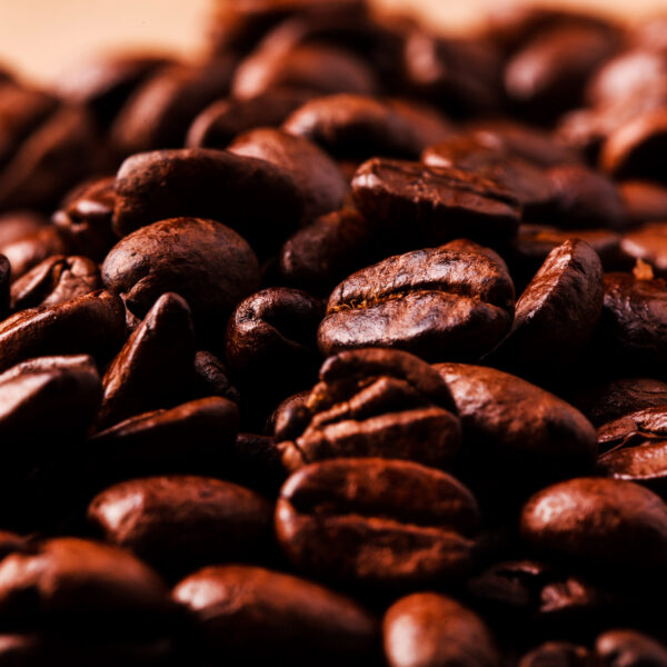 Close-up of brown coffee beans & IoT